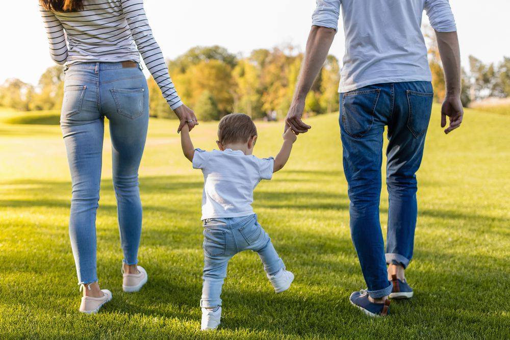 Child walking on grass